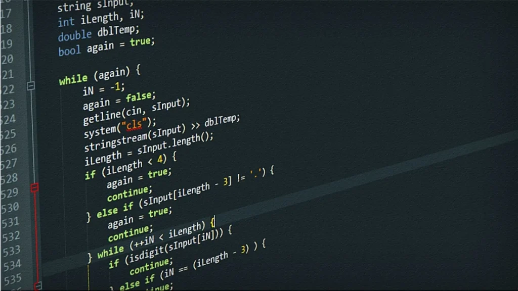 Lignes de code sur un écran sombre, illustration du fichier llms.txt déposé à la racine d'un site